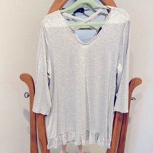 Grey tunic top with criss cross back straps